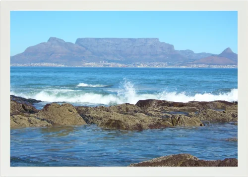 Top view of a Lapzadazy Lap Tray with a picture of Blouberg Rocks, Cape Town