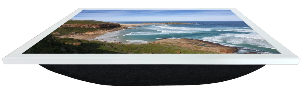 Front perspective view of a Lapzadazy Lap Tray with a picture of Plettenberg Bay